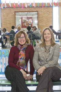 Photo of Miller and Dwight sitting in the Anwatin atrium