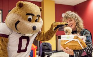 Paw met claw—er, silky body—when Goldy Gopher got a little stress relief from Woodstock and Tanya Bailey at a PAWS location. Woodstock passed away as this issue of Connect went to press, but her therapy goes on through Tilly (Attila the Hen, of the same breed), who began working with her spring semester.