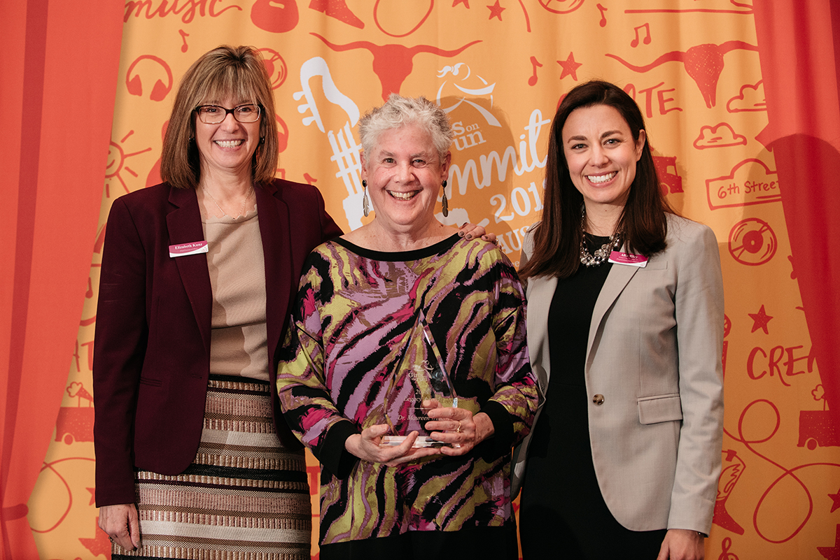 Maureen Weiss celebrates her award with Girls on the Run CEO Elizabeth Kunz (left) and Senior Vice President of Programming and Evaluation Allie Riley.