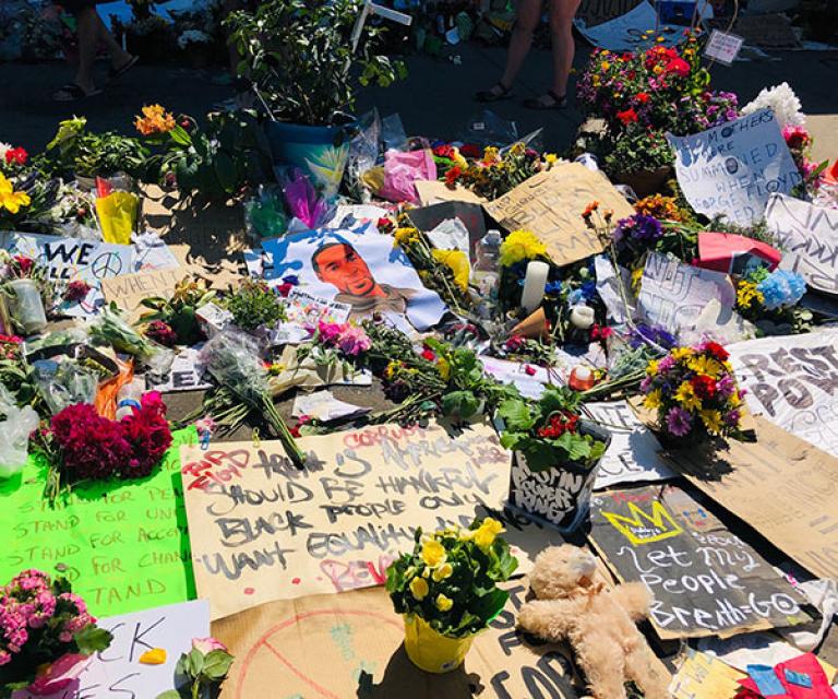 Memorial with posters and flowers