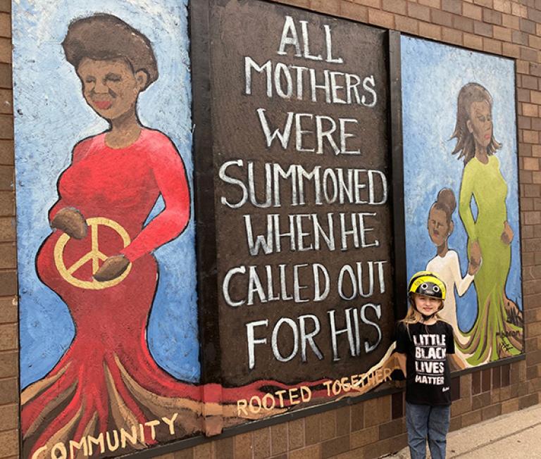Child with poster