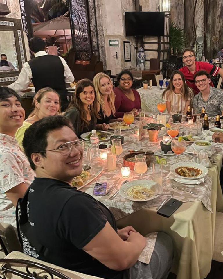 Jack Pham enjoys a group dinner with his study abroad classmates in Mexico