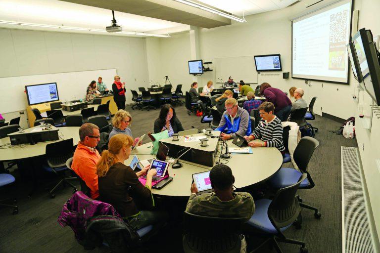 Teachers learning about technology in the classroom