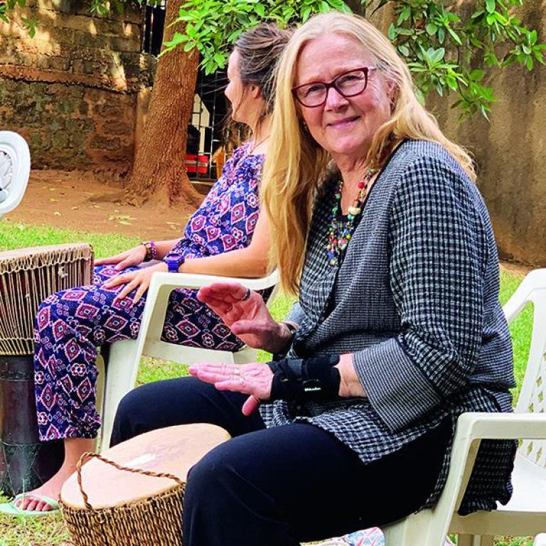 Mary Tjosvold takes part in a drum circle in Kampala, Uganda, in 2019.