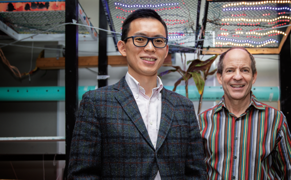 Bodong Chen with Minneapolis South High School teacher David Groos.