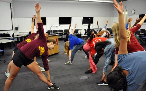 Group of students stretching