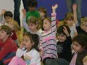 Kids raising hands