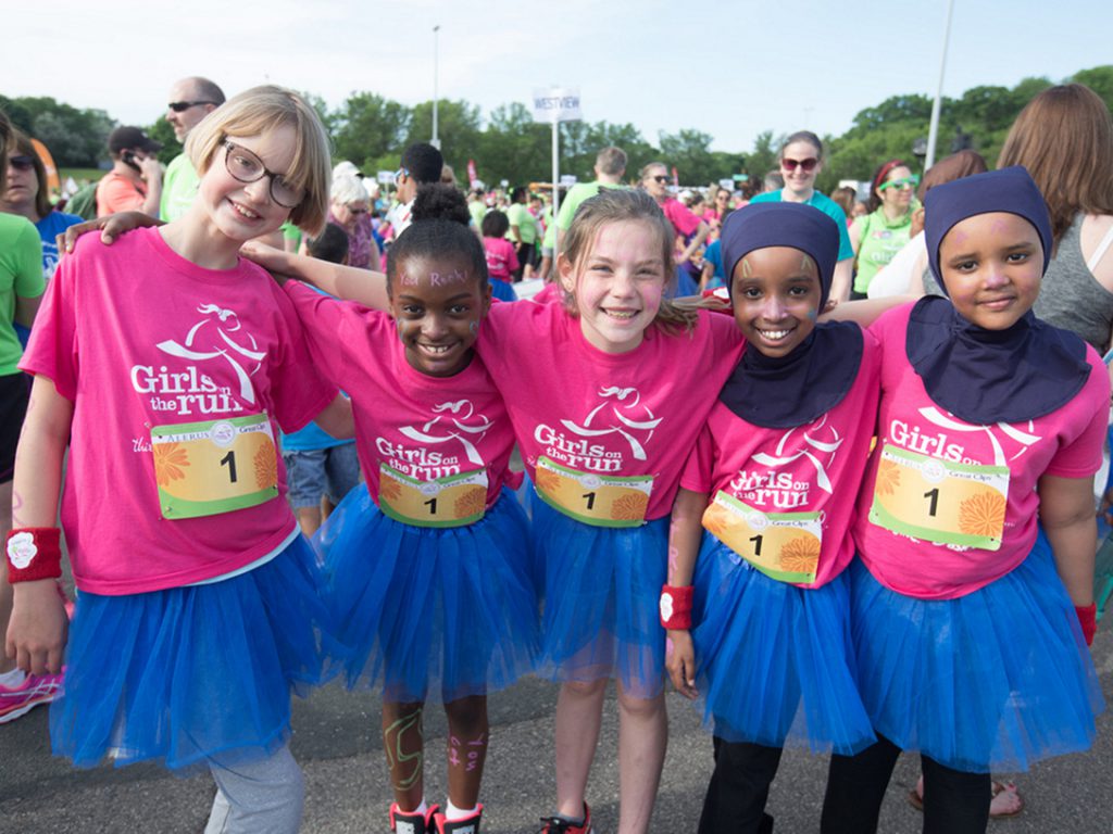 Girls on the Run Twin Cities participants pose during a local race.