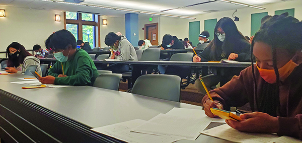 Students taking a test in a classroom