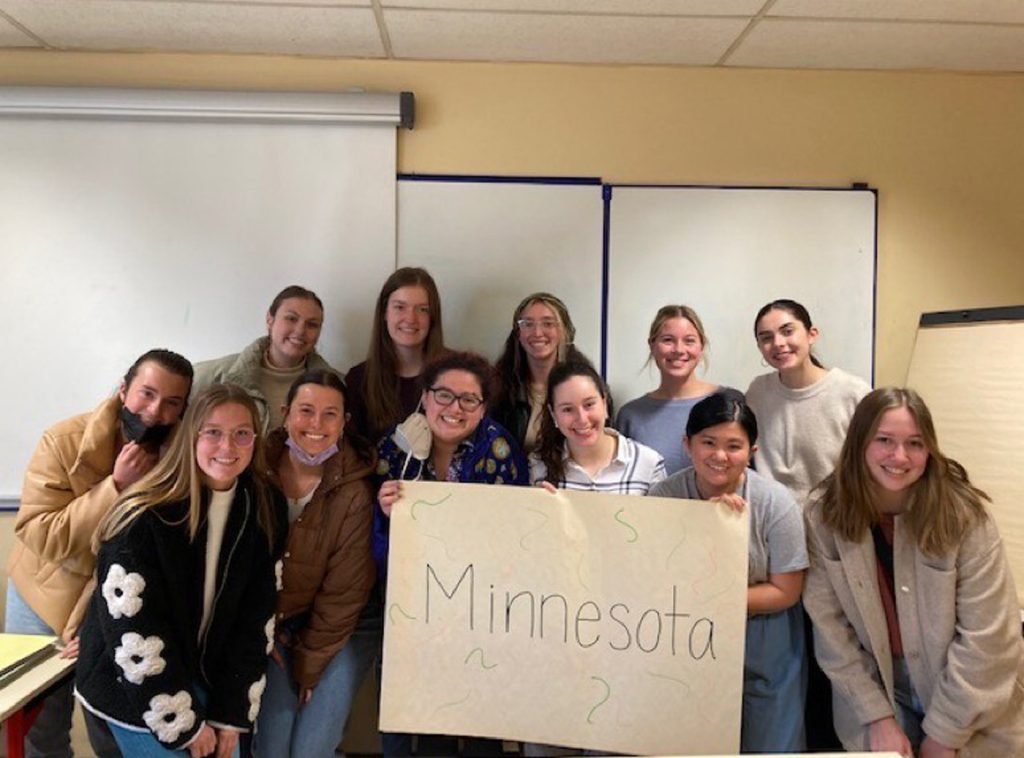 Students holding a sign that says Minnesota