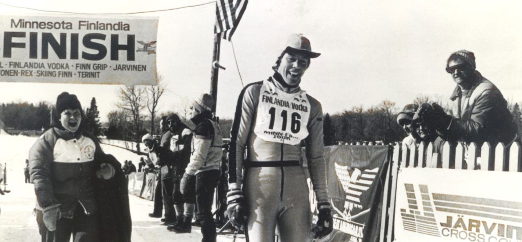 Muriel Gilman crosses the finish line.